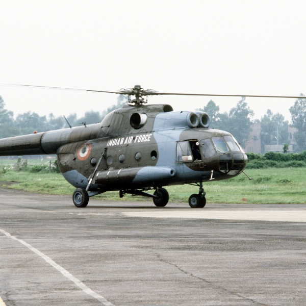 An Indian air force Mi-8 Hip helicopter rolls along a taxiway at an airport in Bangladesh. Indian, the U.S. and nations are sending aid to Bangladesh in response to the severe flooding in that country.